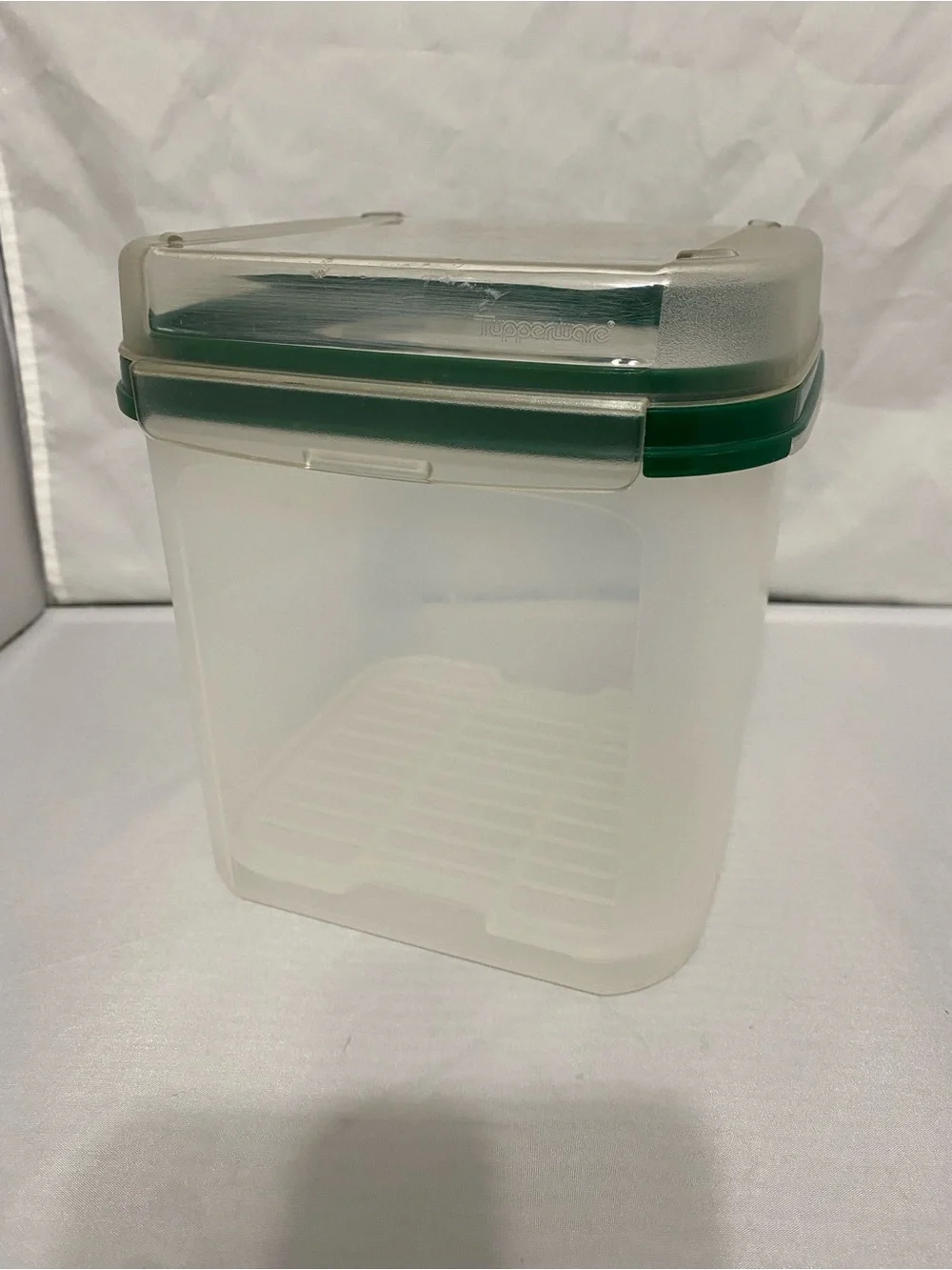 Tupperware Container with Green Rim and Flip Top Lid
